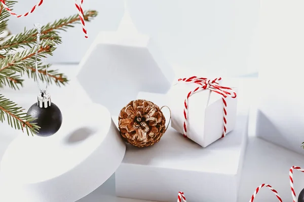 Christmas composition. Spruce branches podium cones and Christmas balls — Stock Photo, Image