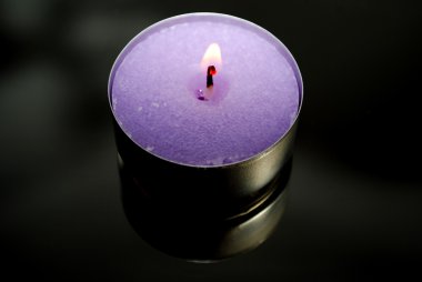 Purple Candle Over Black clipart