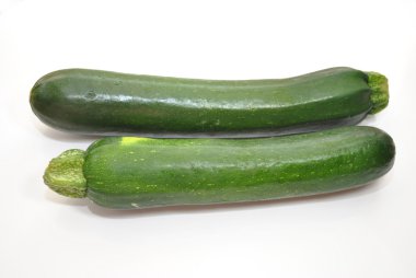 Two Zucchini Squashes Isolated Over White clipart