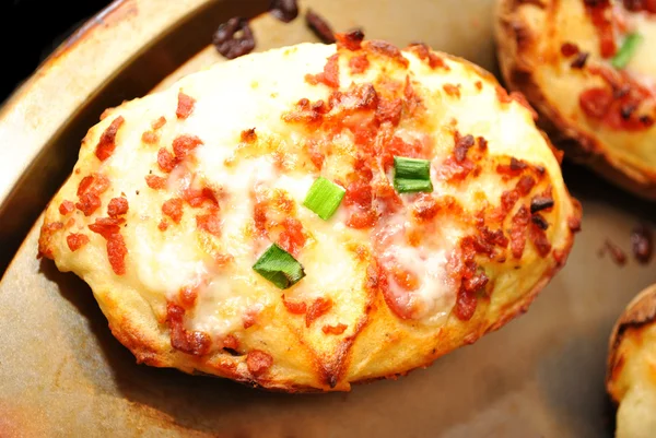 Twice Baked Potato with Cheesy Bacon on a Baking Pan — Stock Photo, Image