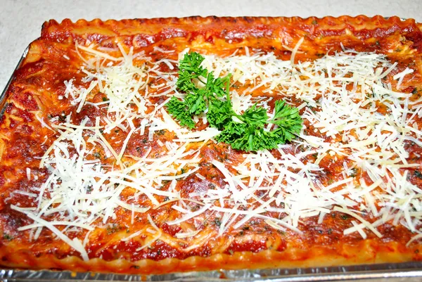 Lasagna with Fresh Parmesan Shredded Cheese — Stock Photo, Image