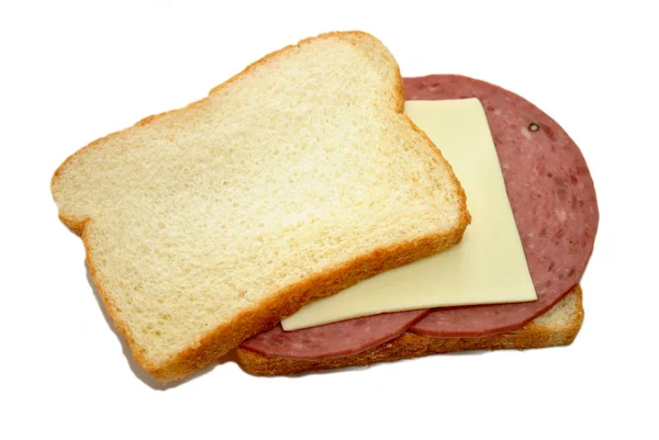 Τερακότα σαλάμι και τυρί αμερικάνικες, στο άσπρο ψωμί — Φωτογραφία Αρχείου