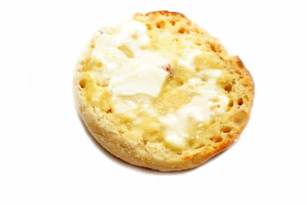 Tereyağlı İngiliz muffin beyaz izole — Stok fotoğraf