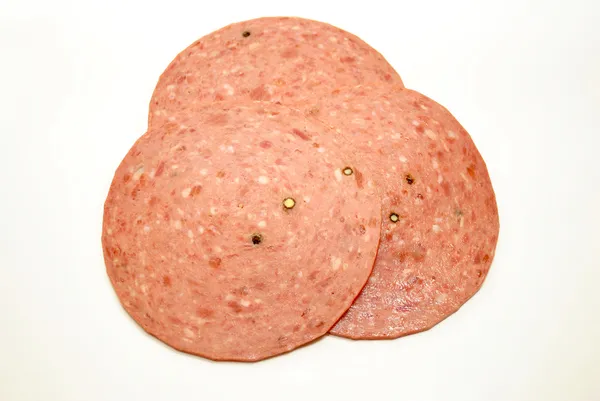 Trzy plasterki salami Delikatesy mięsne cotta — Zdjęcie stockowe