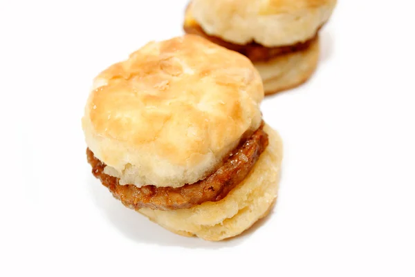 Close-Up of a Hot Sausage Sandwich with Biscuits — Stock Photo, Image