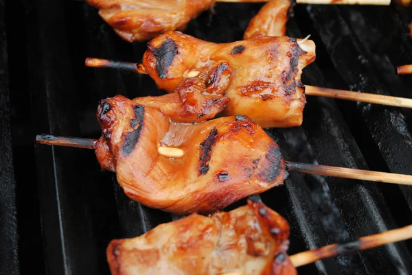 Close-Up of Chicken on Stick Grilling — Stock Photo, Image