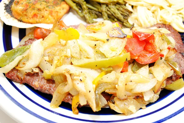 Cube Steak Smothered with Fried Onions and Peppers — Stock Photo, Image