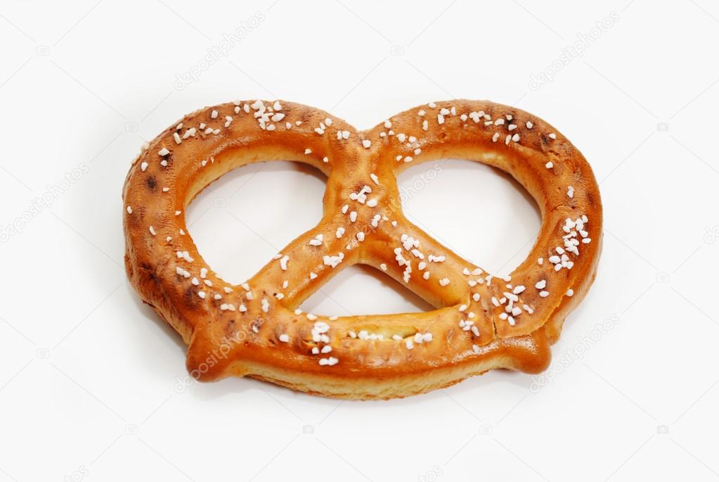 A Delicious Baked Soft Pretzel Over White — Stock Photo © bandd 47755247