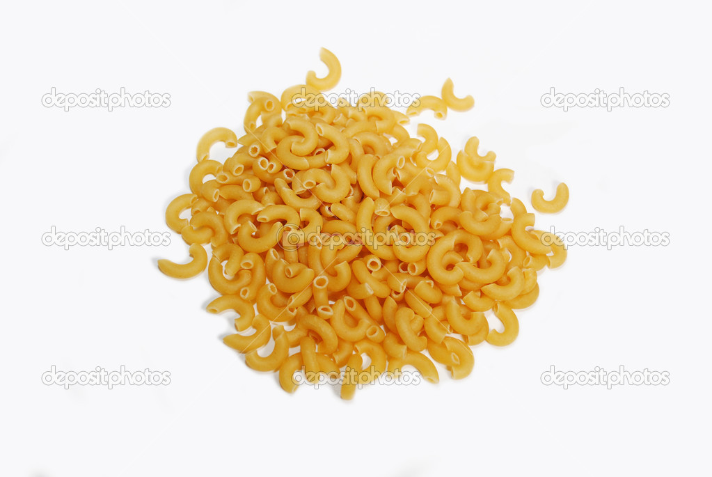 Heap of Dried Elbow Pasta Over White