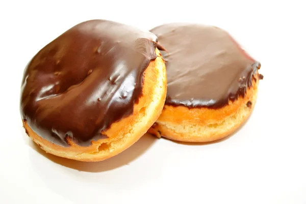 Two Chocolate Glazed Donuts Over White — Stock Photo, Image