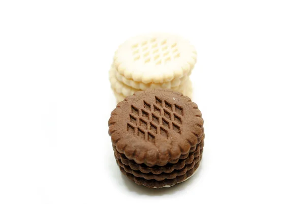 Chocolate Cookies Stacked in Front of Vanilla Cookies — Stock Photo, Image