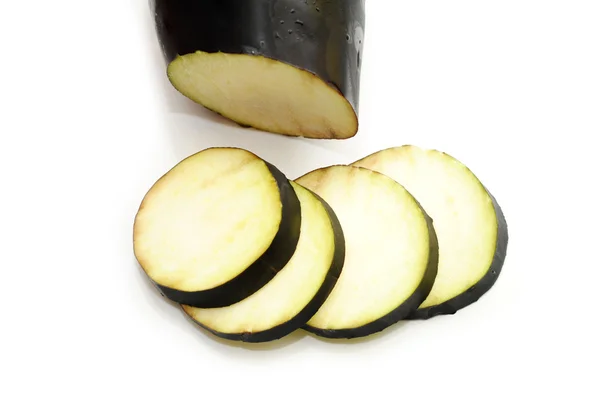 Sliced Raw Eggplant Over a White Back Ground — Stock Photo, Image