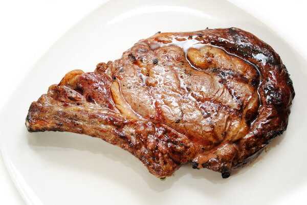 Grilled T Bone Steak Served on a Plate