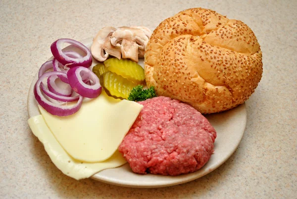 Cheeseburger Ingredients with a Fresh Roll — Stock Image Cheeseburger Ingredients with a Fresh Roll Stock Image