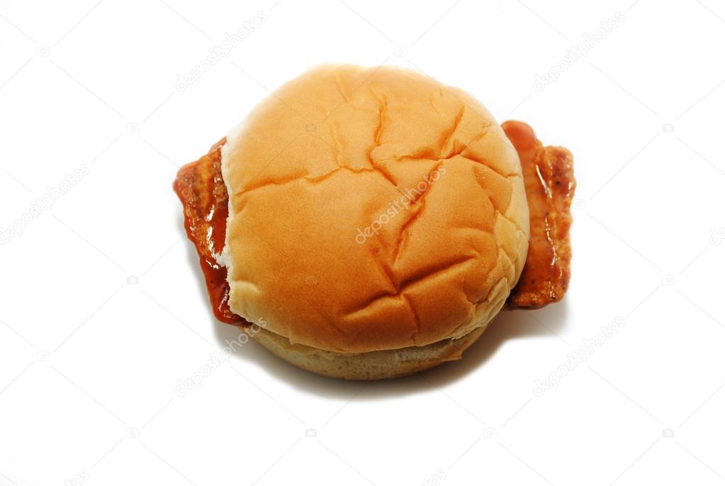 Top View of Boneless Pork on a Soft Bun