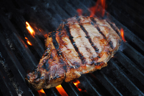 Flame Grilling a Lean Beef Steak on the Grill