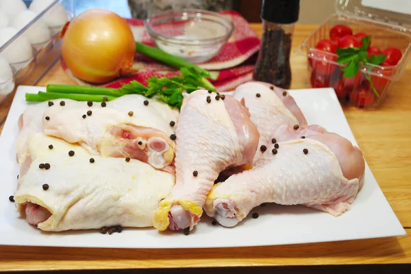 Raw Chicken Legs Thighs Plate Fresh Black Peppercorns — Stock Photo, Image