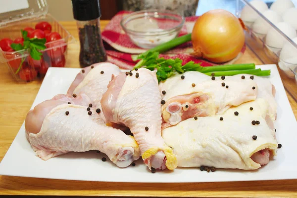 Raw Chicken Legs Thighs Plate Fresh Black Peppercorns — Stock Photo, Image