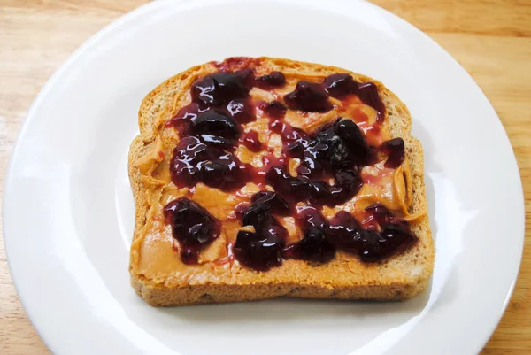 Preparing Peanut Butter Jelly Sandwich — Stock Photo, Image