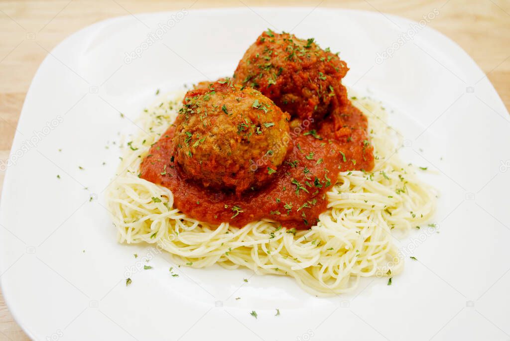 Two Large Meatballs with Marinera Sauce Over Pasta