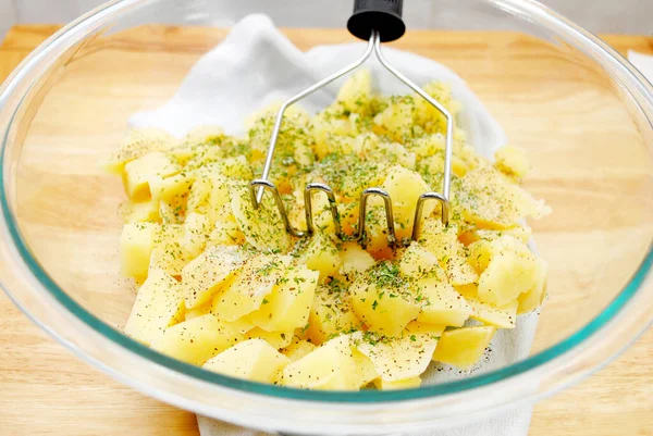 Mashing Boiled Potatoes Glass Bowl — Stock Photo, Image