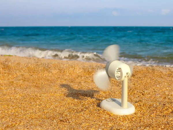 A fan on the beach — Stock Photo, Image