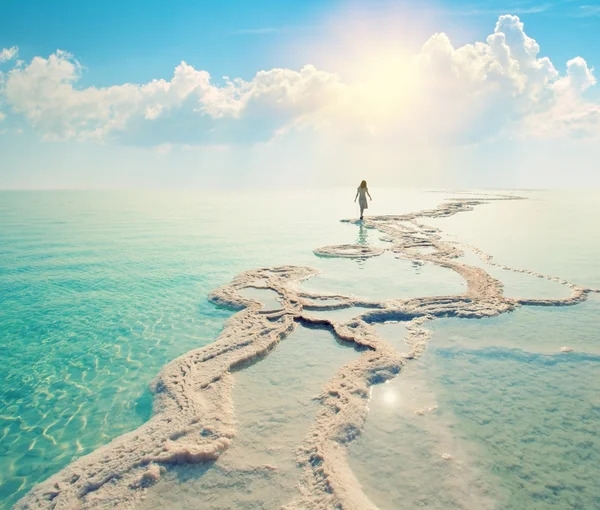 Silhouette of young woman on beach — Stock Photo, Image