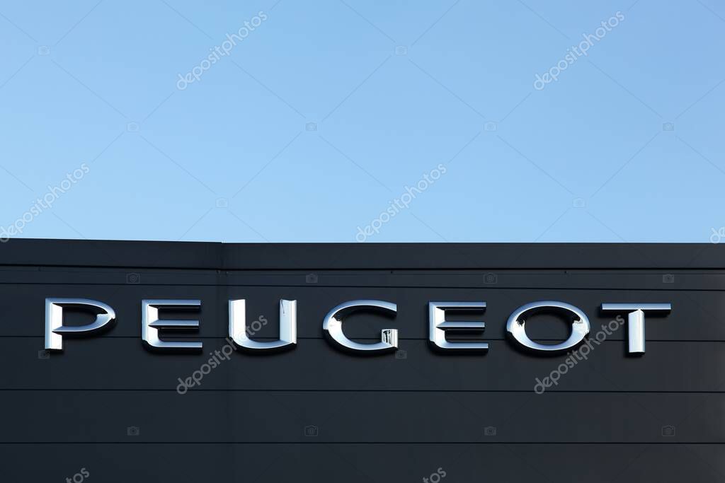 Belleville, France - September 20, 2015: Peugeot sign on a wall. Peugeot is a French cars brand, part of peugeot Citroen automobile group