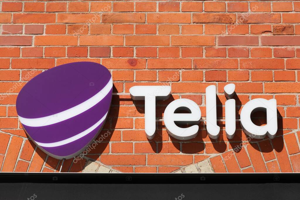 Svendborg, Denmark - August 13, 2020: Telia logo on a wall. Telia is the dominant telephone company and mobile network operator in Sweden and Finland