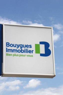 Tassin, France - June 28, 2020: Bouygues Immobilier logo on a wall. Bouygues Immobilier is the real estate development company of the Bouygues group