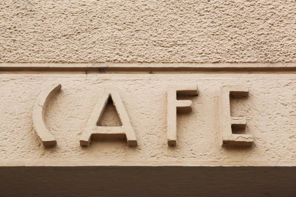 Cafe sign on a wall