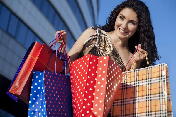 She has a lot of shopping — Stock Photo, Image