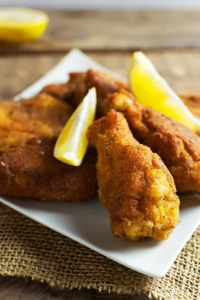 Crispy Breaded Chicken Wings Legs Lemon Slices Wooden Background Fried — Stock Photo, Image