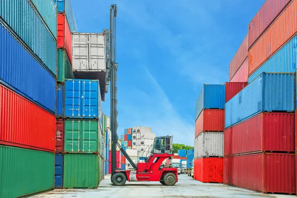 Crane lifter handling container box loading to truck in import e — Stock Photo, Image