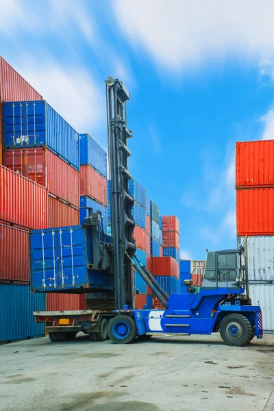 Crane lifter handling container box loading to truck in import e — Stock Photo, Image