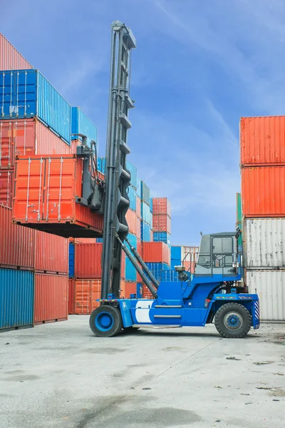 Crane lifter handling container box loading to truck in import e — Stock Photo, Image