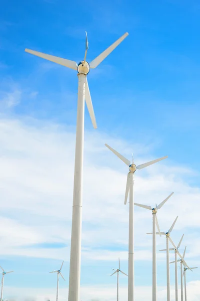 Wind mill power plant against blue sky — Stock Photo, Image