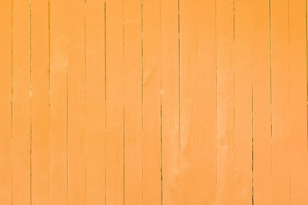 Imagem de fundo de uma parede de madeira pintada na cor vermelha brilhante — Fotografia de Stock