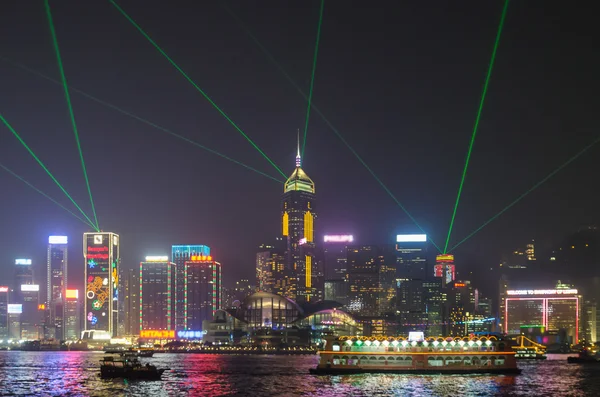 Hong Kong city skyline at night over Victoria Harbor — Stock Photo, Image