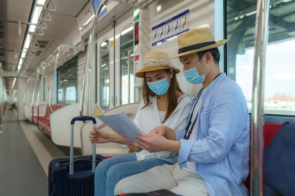 Portrait Asian Couple Tourists Mask Standing Holding Paper Metro Map — Stock Photo, Image