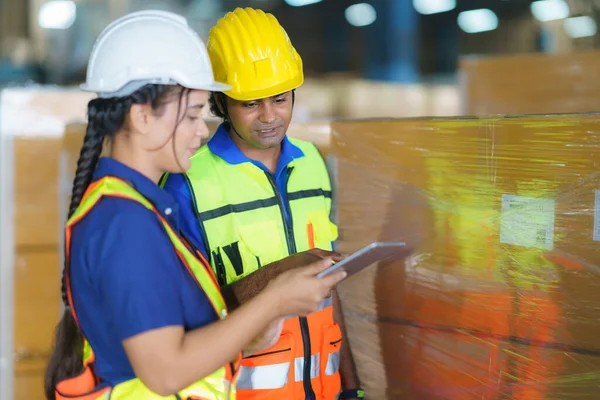 Asian Couple Warehouse Workers Checking Shipment Status Digital Tablet Computer — Stock Photo, Image