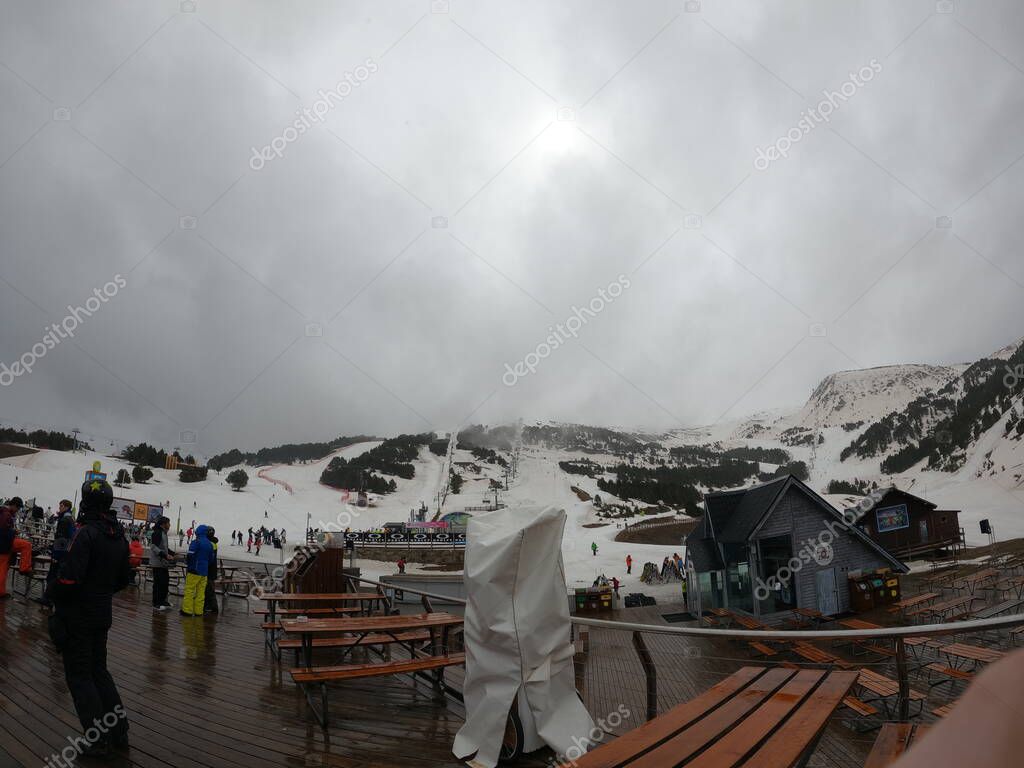 Grandvalira, Andorra, april, 12,2022: view of the snowy mountains and