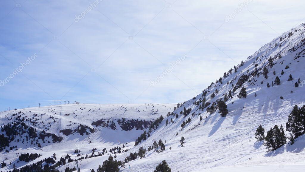 landscapes of the Grandvalira ski resort in the Pyrenees in Andorra on a sunny day in April
