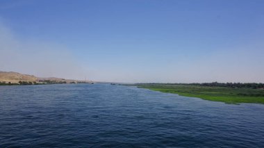 Landscape of the Nile river in Egypt seen from a boat