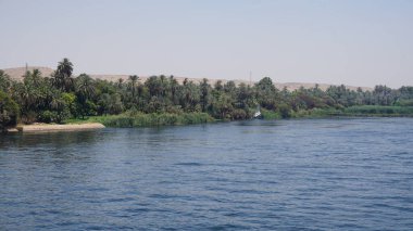 Landscape of the Nile river in Egypt seen from a boat