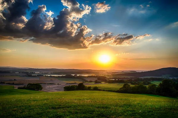 Landscape with colorful sunset Stock Image