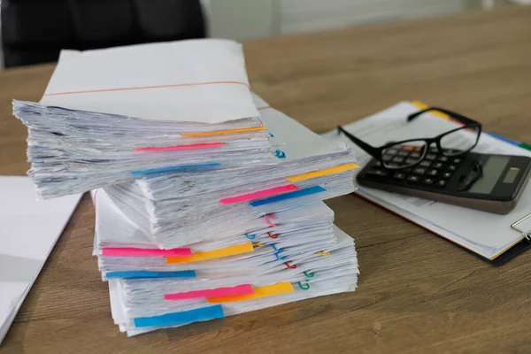 business administration and data documents on office desk, Stack of business overload paper.