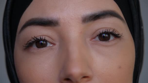 Sad Young Muslim womans eyes close up. Womens rights and Anti-racism. Arabian woman having feeling anxiety depression, upset frustrated lonely lady thinking of troubled. Emotional unhappy and stress — Stock Video