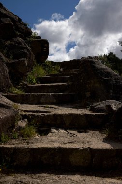 Stairs in the rock. Ascent to a viewpoint on the Fafiao river (Portugal)