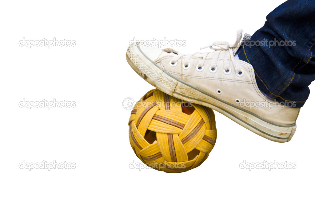 foot and old shoes on Rattan ball , asia favorite sports 